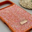 قاب گوشی iPhone 17 Pro Max آیفون نگین دار سواروسکی SWAROVSKI پلاک فلزی نارنجی کد 151404