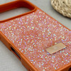 قاب گوشی iPhone 17 Pro آیفون نگین دار سواروسکی SWAROVSKI پلاک فلزی نارنجی کد 151409