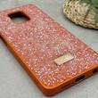 قاب گوشی Redmi Note 9S - Redmi Note 9 Pro شیائومی نگین دار سواروسکی SWAROVSKI پلاک فلزی نارنجی کد 151505