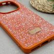 قاب گوشی Redmi Note 14 Pro 4G شیائومی نگین دار سواروسکی SWAROVSKI پلاک فلزی نارنجی کد 151543