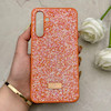 قاب گوشی Galaxy A16 سامسونگ نگین دار سواروسکی SWAROVSKI پلاک فلزی نارنجی کد 150800