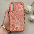 قاب گوشی Galaxy A16 سامسونگ نگین دار سواروسکی SWAROVSKI پلاک فلزی نارنجی کد 150800