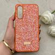 قاب گوشی Galaxy A17 سامسونگ نگین دار سواروسکی SWAROVSKI پلاک فلزی نارنجی کد 150810