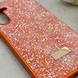قاب گوشی Galaxy A35 سامسونگ نگین دار سواروسکی SWAROVSKI پلاک فلزی نارنجی کد 152968