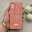 قاب گوشی Galaxy A51 سامسونگ نگین دار سواروسکی SWAROVSKI پلاک فلزی نارنجی کد 152976