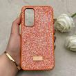 قاب گوشی Galaxy A54 سامسونگ نگین دار سواروسکی SWAROVSKI پلاک فلزی نارنجی کد 152987