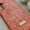 قاب گوشی Galaxy A55 سامسونگ نگین دار سواروسکی SWAROVSKI پلاک فلزی نارنجی کد 152991