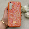 قاب گوشی Galaxy A55 سامسونگ نگین دار سواروسکی SWAROVSKI پلاک فلزی نارنجی کد 152991
