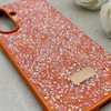 قاب گوشی Galaxy A56 سامسونگ نگین دار سواروسکی SWAROVSKI پلاک فلزی نارنجی کد 152998