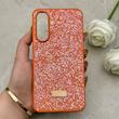 قاب گوشی Galaxy A56 سامسونگ نگین دار سواروسکی SWAROVSKI پلاک فلزی نارنجی کد 152998