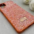 قاب گوشی Galaxy A12 - M12 سامسونگ نگین دار سواروسکی SWAROVSKI پلاک فلزی نارنجی کد 153007