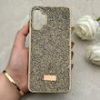 قاب گوشی Galaxy A13 4G سامسونگ نگین دار سواروسکی SWAROVSKI پلاک فلزی طلایی کد 153012