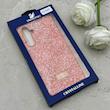 قاب گوشی Galaxy S23 FE سامسونگ نگین دار سواروسکی SWAROVSKI پلاک فلزی نارنجی کد 153036