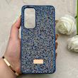 قاب گوشی Galaxy S24 FE سامسونگ نگین دار سواروسکی SWAROVSKI پلاک فلزی سرمه ای کد 153039