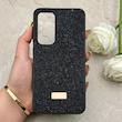 قاب گوشی Galaxy S24 FE سامسونگ نگین دار سواروسکی SWAROVSKI پلاک فلزی مشکی کد 153043