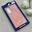 قاب گوشی Galaxy S24 FE سامسونگ نگین دار سواروسکی SWAROVSKI پلاک فلزی نارنجی کد 153045