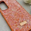 قاب گوشی Galaxy S24 FE سامسونگ نگین دار سواروسکی SWAROVSKI پلاک فلزی نارنجی کد 153045