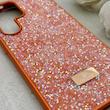قاب گوشی Galaxy S25 Ultra سامسونگ نگین دار سواروسکی SWAROVSKI پلاک فلزی نارنجی کد 153049