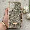قاب گوشی Galaxy S25 Ultra سامسونگ نگین دار سواروسکی SWAROVSKI پلاک فلزی طلایی کد 153050