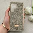 قاب گوشی Galaxy S23 Ultra سامسونگ نگین دار سواروسکی SWAROVSKI پلاک فلزی طلایی کد 153056
