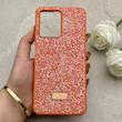قاب گوشی Redmi Note 12 4G شیائومی نگین دار سواروسکی SWAROVSKI پلاک فلزی نارنجی کد 153078