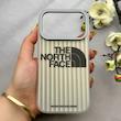قاب گوشی iPhone 17 Pro آیفون کرکره ای لیزری سخت Hard براش اسپرت لنزسیلور طرح The North Face کد 152324