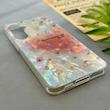 قاب گوشی Galaxy S24 FE سامسونگ فانتزی براق IMD لیزری لاکچری سخت HARD طرح گل زیبا کد 154461