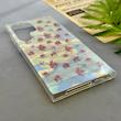 قاب گوشی Galaxy S24 Ultra سامسونگ فانتزی براق IMD لیزری لاکچری سخت HARD طرح گل زیبا کد 154492