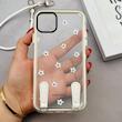 قاب گوشی iPhone 11 Pro Max آیفون طلقی شفاف شیشه ای فانتزی دارای آویزبند چرمی فلزی طرح گل های بابونه کد 153817