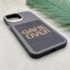 قاب گوشی iPhone 13 Pro Max آیفون فانتزی اسپرت HARD لنز سیلور طرح GAME OVER کد 156639