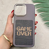 قاب گوشی iPhone 16 Pro Max آیفون فانتزی اسپرت HARD لنز سیلور طرح GAME OVER کد 156650