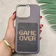 قاب گوشی iPhone 16 Pro Max آیفون فانتزی اسپرت HARD لنز سیلور طرح GAME OVER کد 156650
