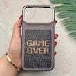 قاب گوشی iPhone 17 Pro Max آیفون فانتزی اسپرت HARD لنز سیلور طرح GAME OVER کد 156661