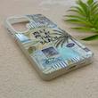 قاب گوشی Galaxy S26 Ultra سامسونگ HARD فانتزی دکمه کرومی لنز برجسته دورمات طرح ساحل کیوت کد 158786
