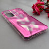 قاب گوشی Galaxy S23 FE سامسونگ موج دار ابر و بادی براق درجه یک لنز برجسته طرح پروانه صورتی کد E19-159174