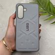 قاب گوشی Galaxy A17 سامسونگ UAG Design سیلیکونی ژله ای محافظ لنز دار طوسی کد 163042
