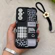 قاب گوشی Galaxy S23 FE سامسونگ سیلیکونی ژله ای Solid لاکچری محافظ لنزدار به همراه بند مچی مشکی کد 164817