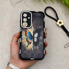 قاب گوشی Galaxy S23 FE سامسونگ سیلیکونی ژله ای Solid لاکچری محافظ لنزدار به همراه بند مچی مشکی کد 164819