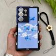 قاب گوشی Galaxy S24 Ultra سامسونگ سیلیکونی ژله ای Solid لاکچری محافظ لنزدار به همراه بند مچی مشکی کد 164826