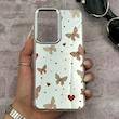 قاب گوشی Galaxy A56 سامسونگ اورجینال فانتزی سخت آینه ای لنز کرومی ایربگ دار طرح پروانه کیوت کد 167416
