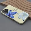 قاب گوشی iPhone 16 آیفون لدر کیس سیلیکونی فانتزی لنز سیلور طرح گل لیلیوم آبی کد 169248