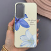 قاب گوشی Galaxy S23 FE سامسونگ لدر کیس سیلیکونی فانتزی لنز سیلور طرح گل لیلیوم آبی کد 169292