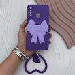 قاب گوشی Galaxy A20S سامسونگ سیلیکونی بنفش پاپیون‌دار با بند قلبی و محافظ لنز