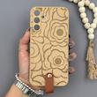 قاب گوشی Galaxy A15 سامسونگ چرمی Hard اورجینال Unique Case بند انگشتی طرح گل نسکافه‌ای