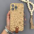 قاب گوشی iPhone 16 Pro Max آیفون چرمی Hard اورجینال Unique Case بند انگشتی طرح گل نسکافه‌ای