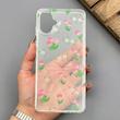 قاب گوشی Galaxy A06 سامسونگ شفاف پشت طلقی شیشه‌ای دور ژله ای طرح گل لاله