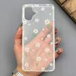 قاب گوشی Galaxy A06 سامسونگ شفاف پشت طلقی شیشه‌ای دور ژله ای طرح گل بابونه