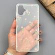 قاب گوشی Galaxy A07 سامسونگ شفاف پشت طلقی شیشه‌ای دور ژله ای طرح گل لاله