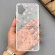 قاب گوشی Galaxy A07 سامسونگ شفاف پشت طلقی شیشه‌ای دور ژله ای طرح گل صورتی