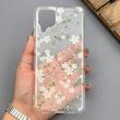 قاب گوشی Galaxy A12 - M12 سامسونگ شفاف پشت طلقی شیشه‌ای دور ژله ای طرح گل سفید